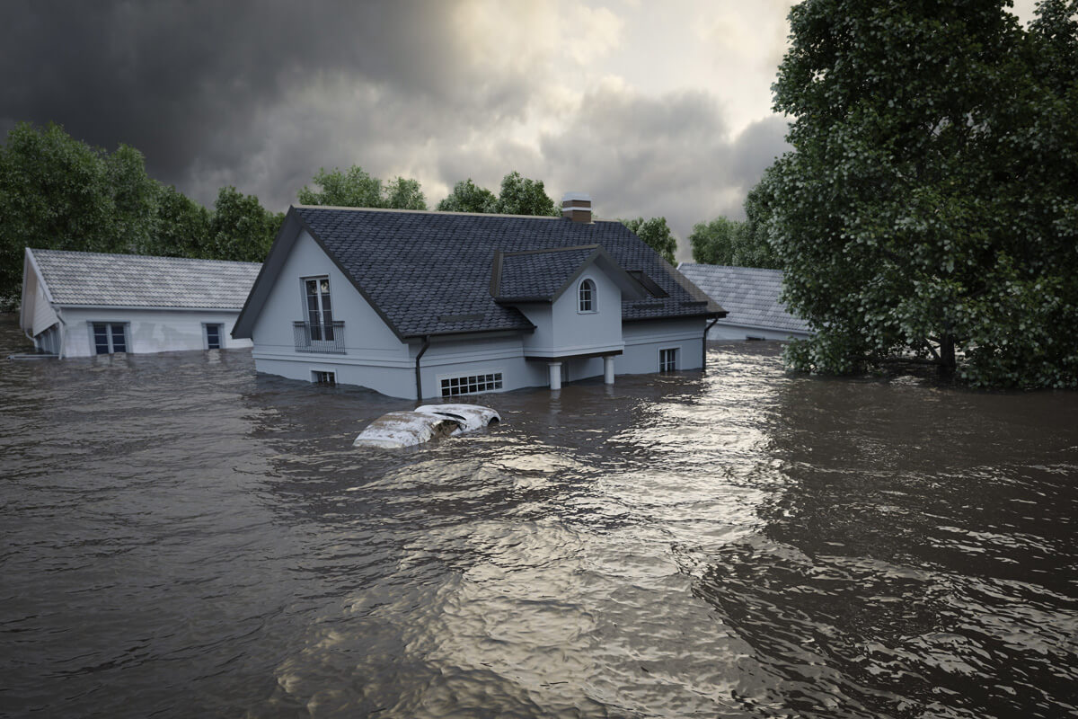Des maisons inondées dont on ne voit que le toit.